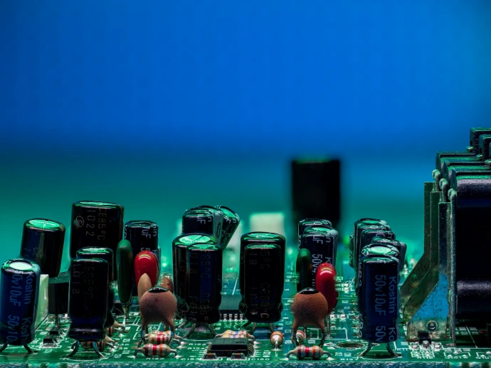 Circuit board filled with electronic components.
